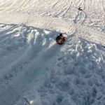 Sledding in Powder at Brian Head Resort